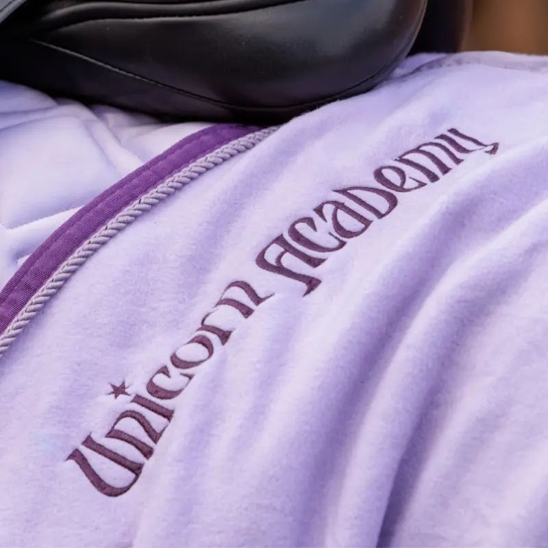 Fleece - Abschwitzdecke "Unicorn Academy" mit Kordel
