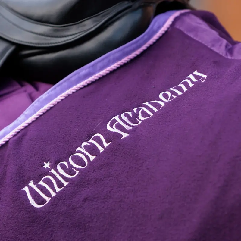 Fleece - Abschwitzdecke "Unicorn Academy" mit Kordel