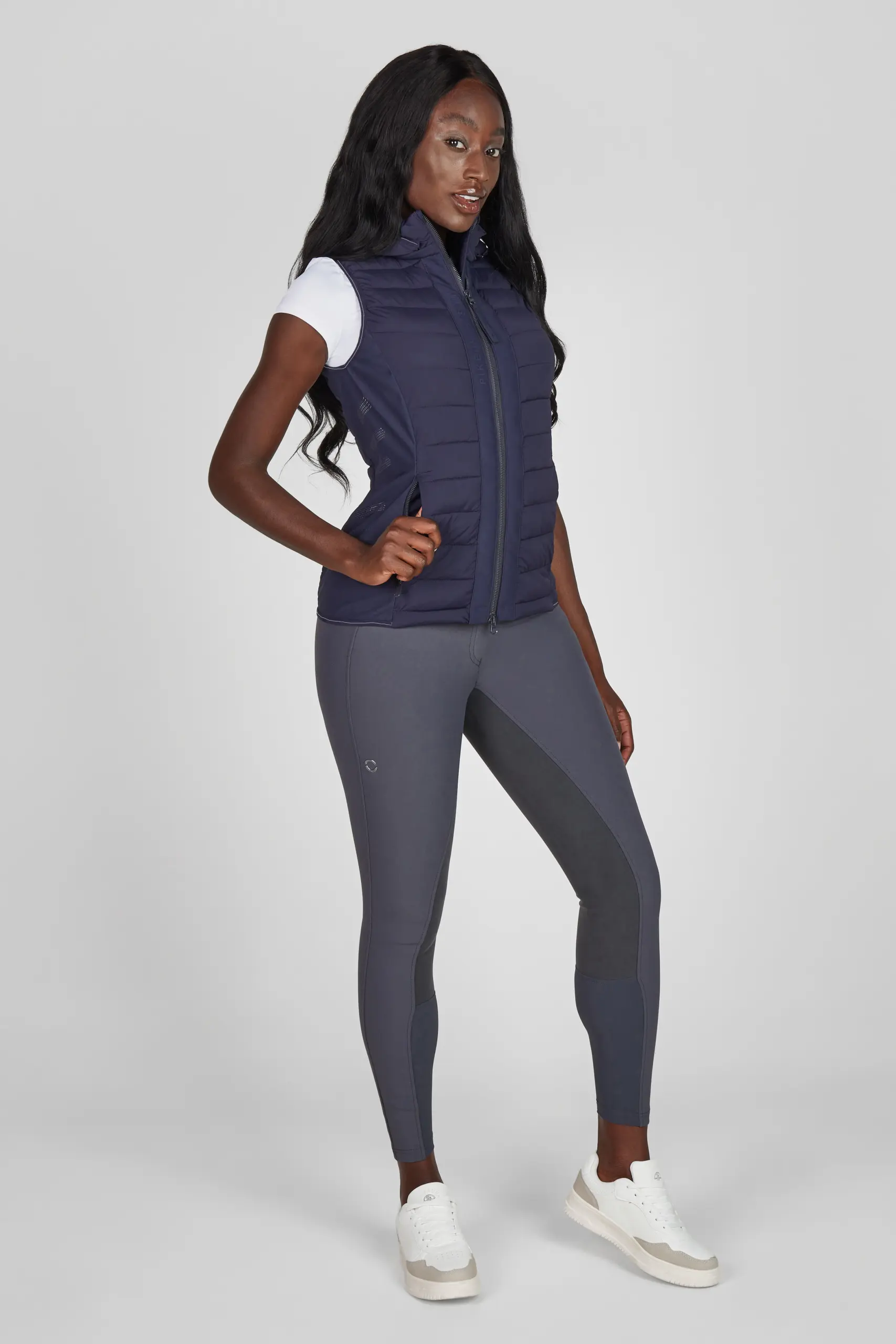 Damen HYBRID VEST The Core Sommer 2026